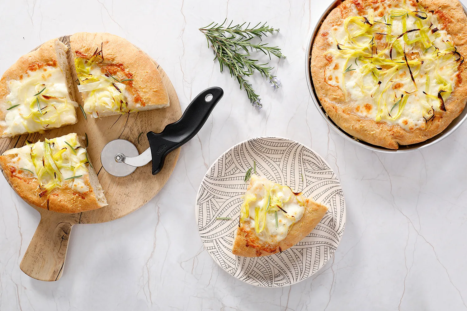 Leek and rosemary pizza, styled for editorial